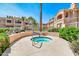 Relaxing hot tub surrounded by lush greenery at 3800 S Cantabria Cir # 1023, Chandler, AZ 85248