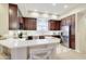 Upgraded kitchen with ample counter space, stainless steel appliances, and a breakfast bar at 3800 S Cantabria Cir # 1023, Chandler, AZ 85248