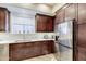 Sleek kitchen featuring stainless steel appliances, white countertops, and ample storage at 3800 S Cantabria Cir # 1023, Chandler, AZ 85248
