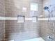 Tiled shower with built-in niches and modern fixtures at 3800 S Cantabria Cir # 1023, Chandler, AZ 85248