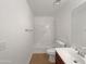 Clean bathroom with a bathtub/shower combo, toilet, and vanity at 44792 W Miraflores St, Maricopa, AZ 85139