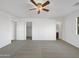 The Primary bedroom has carpet, a ceiling fan, and ensuite bathroom at 44792 W Miraflores St, Maricopa, AZ 85139
