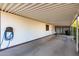 Covered carport with convenient hose hookup at 5502 E Baywood Ave, Mesa, AZ 85206