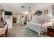 Main bedroom with mirrored closet doors, a daybed, and soft, neutral decor at 5502 E Baywood Ave, Mesa, AZ 85206