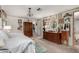 Main bedroom showcasing a vanity area, ample storage, and decorative wall art at 5502 E Baywood Ave, Mesa, AZ 85206