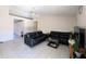 Spacious living room featuring tile floors and a ceiling fan at 6803 W Cherry Hills Dr, Peoria, AZ 85345