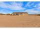 Expansive backyard with a view of the desert landscape at 735 E Hanna Rd, Eloy, AZ 85131