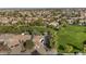 Houses with garages nestled within a green community setting, view from above at 744 E County Down Dr, Chandler, AZ 85249