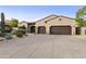 Two-story home with a tile roof and attached two-car garage at 8146 E Wingspan Way, Scottsdale, AZ 85255