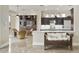 Open living area with kitchen, dining, and sitting areas, and tile flooring at 8146 E Wingspan Way, Scottsdale, AZ 85255