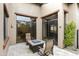 Cozy patio with a fire pit and seating area at 8146 E Wingspan Way, Scottsdale, AZ 85255