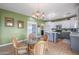 Updated kitchen featuring two-tone cabinets, an island, and stainless steel appliances at 8214 S 15Th St, Phoenix, AZ 85042