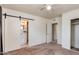 Bedroom with ceiling fan, carpet, and sliding door to closet at 142 W Ivanhoe Pl, Chandler, AZ 85225