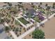 Community park with playground, shaded seating, and bocce ball court at 14829 W El Cortez Pl, Surprise, AZ 85387