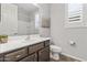 Small bathroom with single sink and toilet at 22459 E Marsh Rd, Queen Creek, AZ 85142