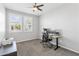 Home office with a standing desk, chair, and printer at 22459 E Marsh Rd, Queen Creek, AZ 85142