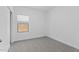 Unfurnished bedroom with neutral carpet and window with blinds at 23395 W Albeniz Pl, Buckeye, AZ 85326