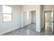 Bedroom with mirrored closet doors and natural light at 24825 W Western Star Blvd, Buckeye, AZ 85326