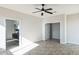 Bedroom with access to bathroom and additional closet space at 24825 W Western Star Blvd, Buckeye, AZ 85326