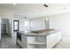 Modern kitchen with large island and ample cabinetry at 24825 W Western Star Blvd, Buckeye, AZ 85326