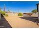 Spacious backyard with dirt and a block wall at 2906 W Palm Ln, Phoenix, AZ 85009