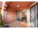 Tiled entryway with double doors leading to the main living area at 4303 E Cactus Rd # 146B, Phoenix, AZ 85032