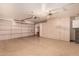 Two-car garage with built-in storage cabinets at 4831 W Del Rio St, Chandler, AZ 85226