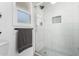 Updated bathroom showcasing a walk-in shower with white subway tile and modern fixtures at 607 E Manhatton Dr, Tempe, AZ 85282