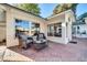 Inviting patio with brick flooring and wicker chairs, perfect for outdoor relaxation at 6315 N 16Th Ave, Phoenix, AZ 85015