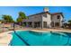 Backyard with pool, patio, and two-story home at 7030 N 181St Ave, Waddell, AZ 85355