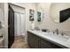 Spacious bathroom with double vanity, modern fixtures, and tiled floor at 9424 E Hidden Spur Trl, Scottsdale, AZ 85255