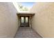 Double door entry with decorative glass panes and a tiled floor at 9834 E Watford Way, Sun Lakes, AZ 85248