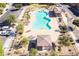 Aerial view of community pool, hot tub, and covered area with lounge chairs at 1414 N 80Th Ln, Phoenix, AZ 85043