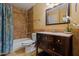 Bathroom with shower/tub and dark vanity at 1717 E Union Hills Dr # 1033, Phoenix, AZ 85024