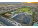 Aerial view of community with park and pool at 17352 W Country Club Ter, Surprise, AZ 85387