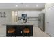 Modern kitchen with granite countertops and kitchen island at 17352 W Country Club Ter, Surprise, AZ 85387