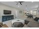Open living space with comfortable seating and an open kitchen at 17352 W Country Club Ter, Surprise, AZ 85387