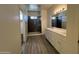 Main bathroom with double vanity, shower and tile flooring at 1741 W Pollack St, Phoenix, AZ 85041