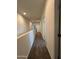 Upstairs hallway with access to bedrooms and bathroom at 1741 W Pollack St, Phoenix, AZ 85041