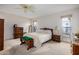 Main bedroom with plush bedding, ample closet space and natural light at 17624 N Lindgren Ave, Sun City, AZ 85373