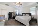 Bedroom with king-size bed and home office setup at 2135 N Heritage St, Buckeye, AZ 85396