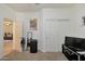 Bedroom with large closet and view into living room at 2135 N Heritage St, Buckeye, AZ 85396