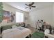 Bedroom with double bed, desk, and window coverings at 2135 N Heritage St, Buckeye, AZ 85396