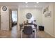 Bright dining area with a farmhouse table and view of the living room at 2135 N Heritage St, Buckeye, AZ 85396