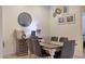 Charming dining area featuring a wooden table and comfortable seating at 2135 N Heritage St, Buckeye, AZ 85396