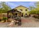 Large backyard with pergola, patio, and grill at 24018 W Wayland Dr, Buckeye, AZ 85326