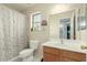 Clean bathroom with a shower/tub combo, vanity, and toilet at 24018 W Wayland Dr, Buckeye, AZ 85326