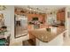 Modern kitchen with stainless steel appliances and granite countertops at 24018 W Wayland Dr, Buckeye, AZ 85326
