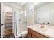 Bathroom with shower, toilet, vanity, and linen closet at 29007 N 120Th Dr, Peoria, AZ 85383