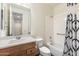 Clean bathroom with tub shower, vanity, and toilet at 29007 N 120Th Dr, Peoria, AZ 85383